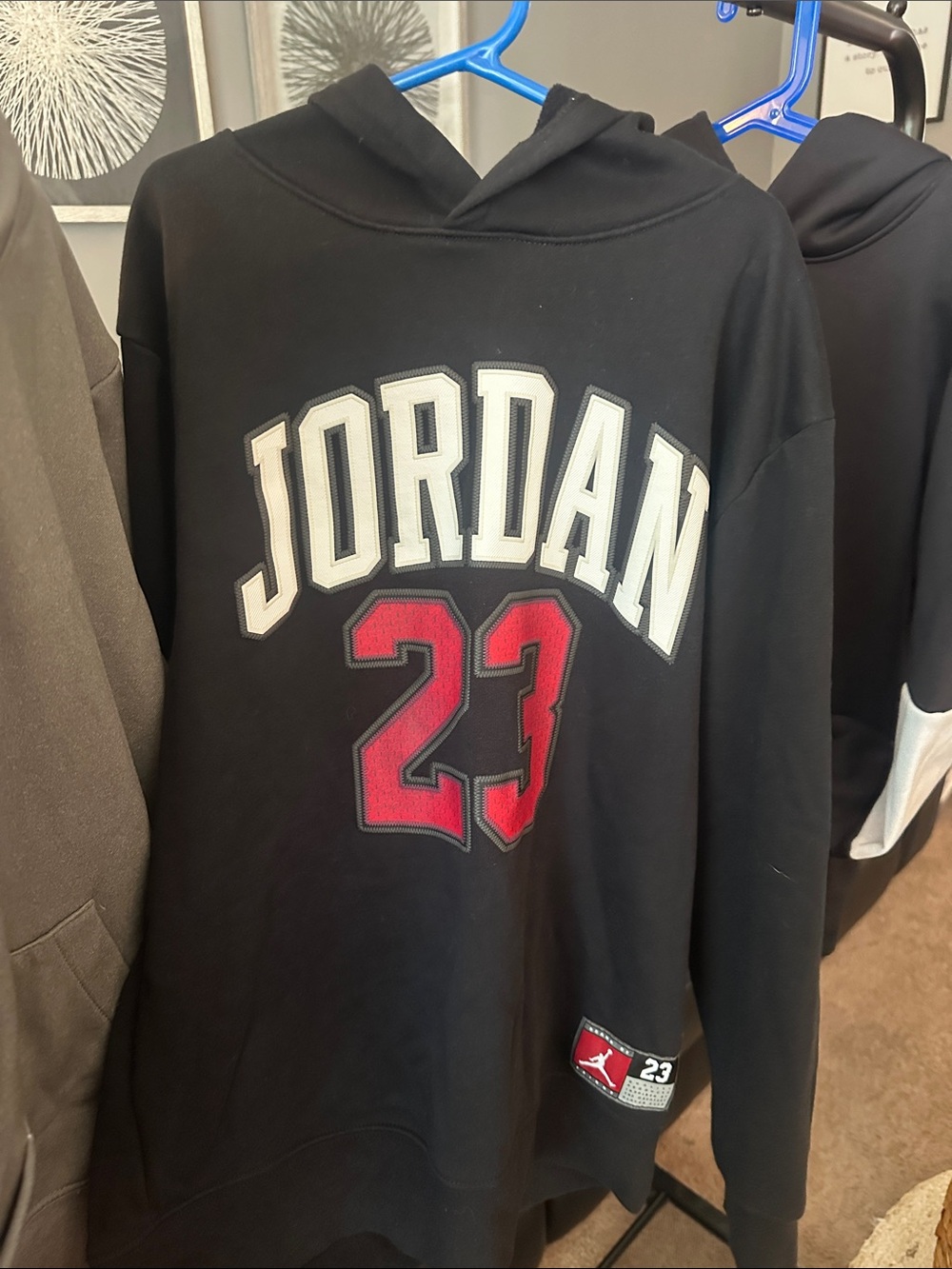 Jordan Black Hoodie with White Lettering and Red '23 Graphic